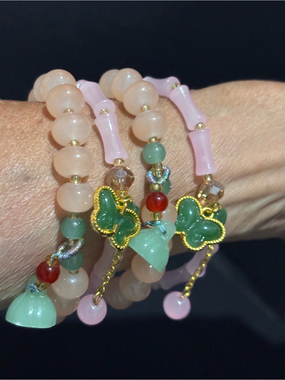 PINK & CORAL GLASS BAMBOO BEADED BRACELETS W/BUTTERFLY MONEY BAG CHARMS SET 4PC